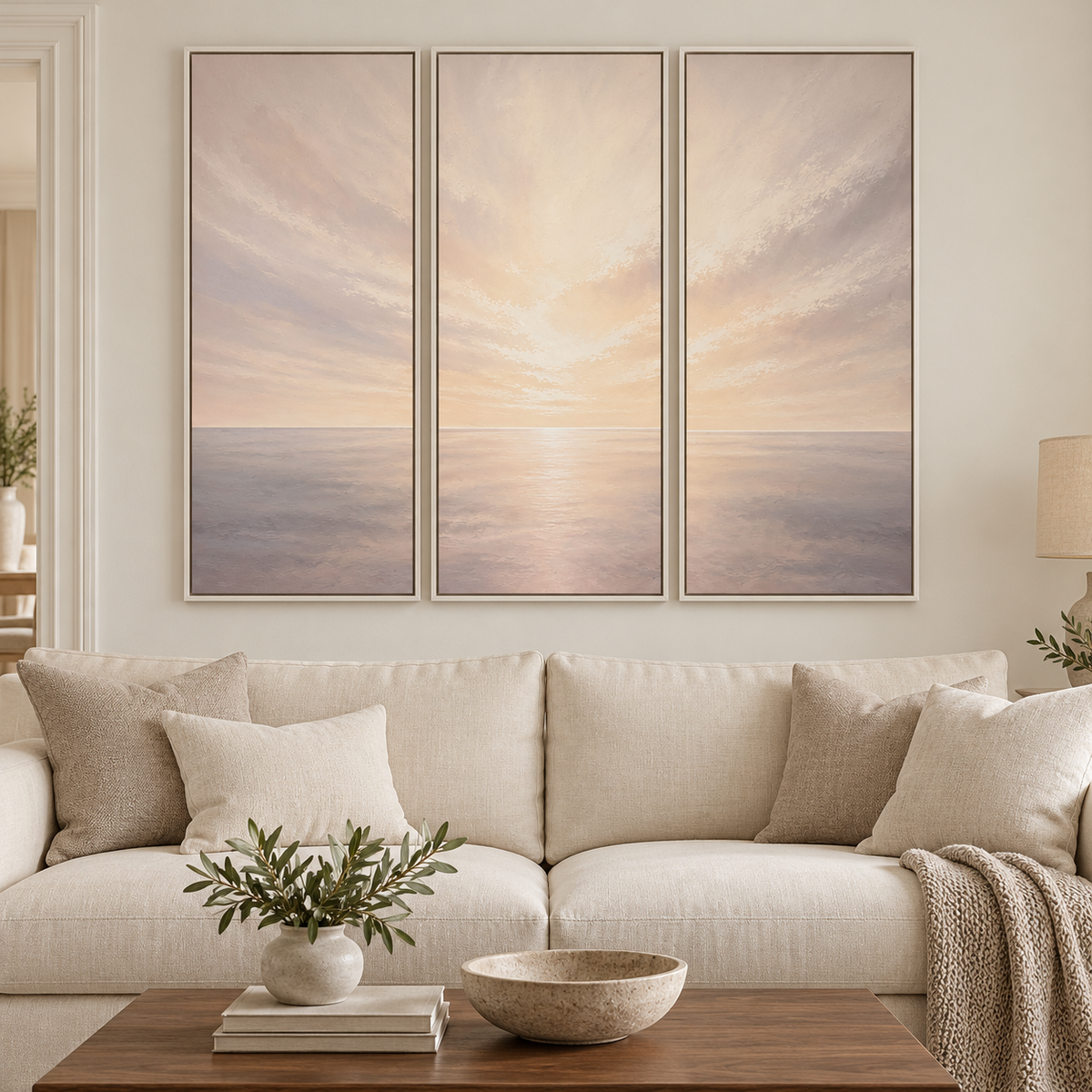 Where Light Rests Triptych above a cream sofa