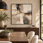 Contour abstract canvas in black float frame above a walnut sideboard